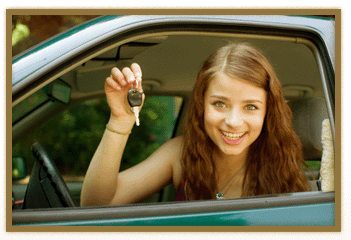 Smiling student holding car keys